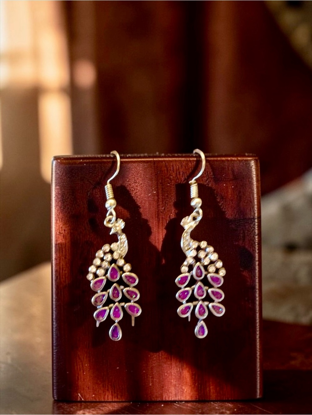 Elegant Silver-Tone Peacock Drop Earrings with Purple Gem Accents